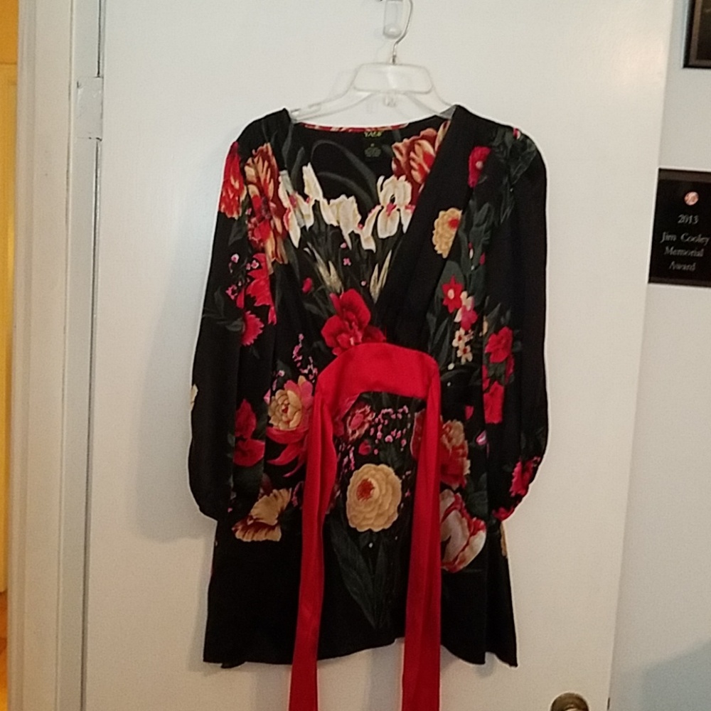 Soft black blouse with red sash.  Ties in back.